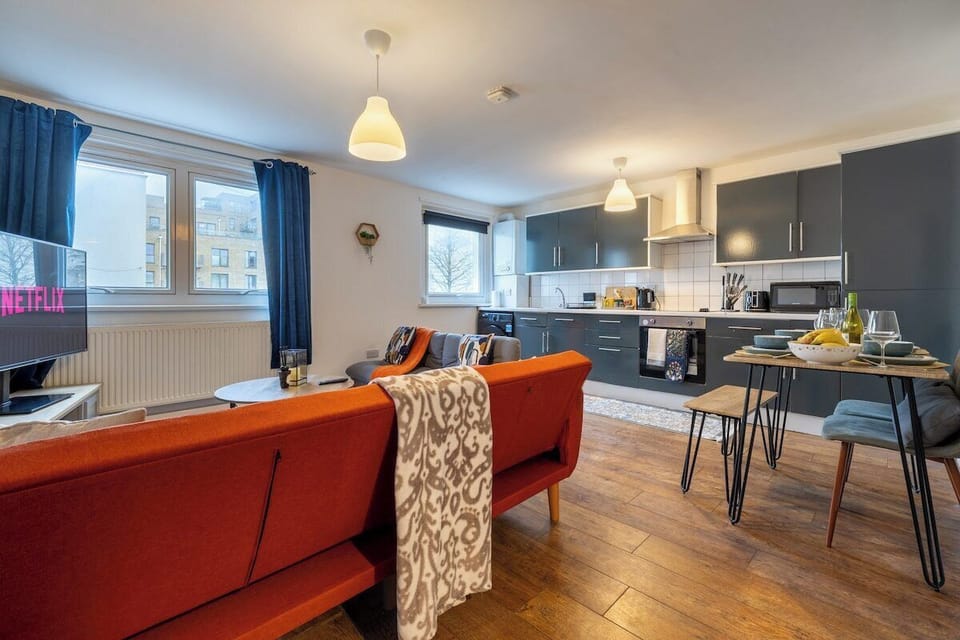 Kitchen & Dining Area: Stylish space to whip up meals and enjoy good times with friends!