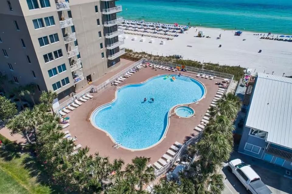 Tidewater Resort Pools and Hot Tubs: 2 Large, resort style pools, 2 Hot Tubs overlooking the Gulf of Mexico - This pool can be seen from the condo windows and balcony - watch the kids below!