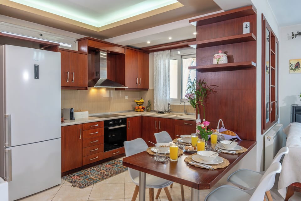 Family Apartment, Balcony, Garden View | Private kitchen | Full-size fridge, microwave, oven, stovetop