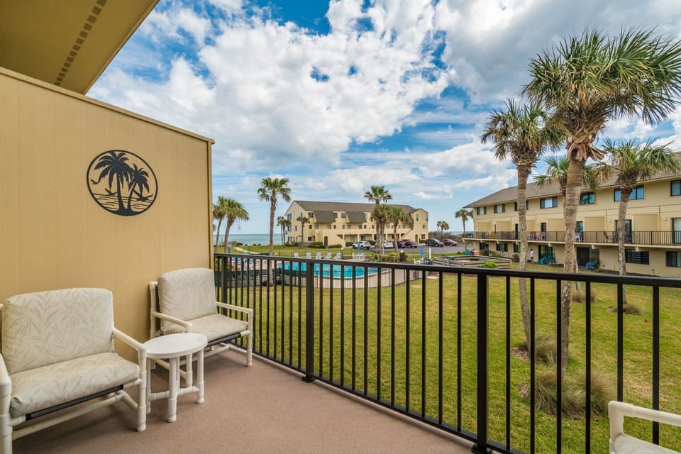 Porch overlooking the pool