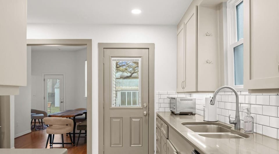 Cook and serve with the dining table just steps away. Quartz counters and full-size appliances make meal prep easy.