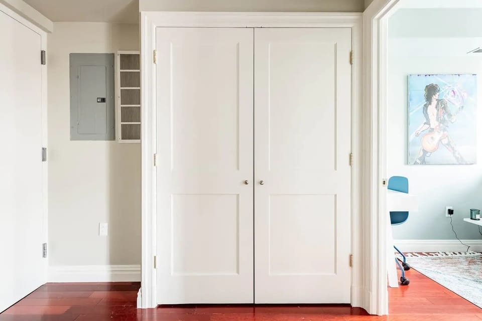 Step back into the hall to reach the third bedroom