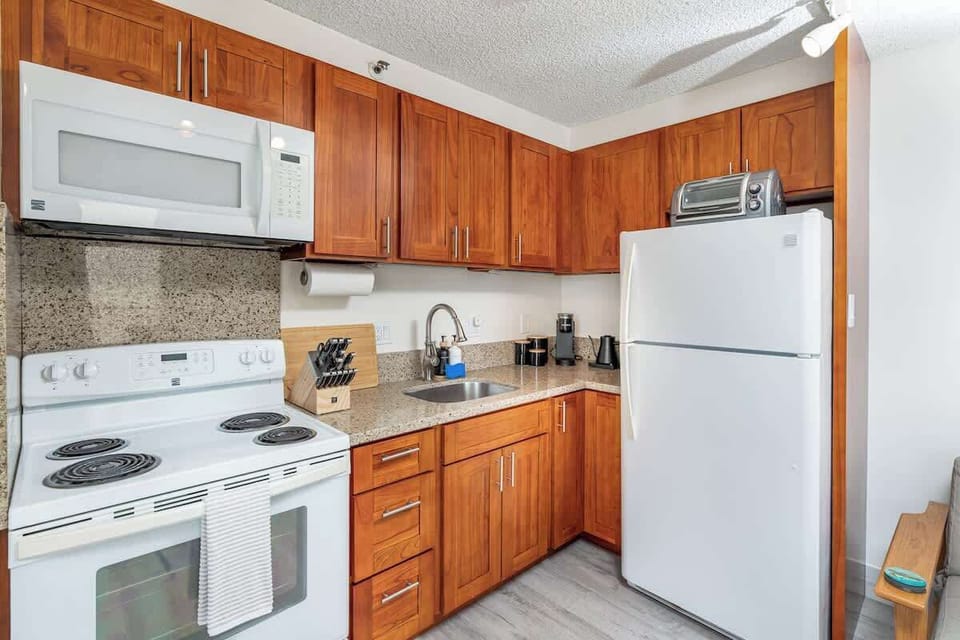 Another look at the spacious kitchen.  Bathroom is down the hallway to the left from this image. 