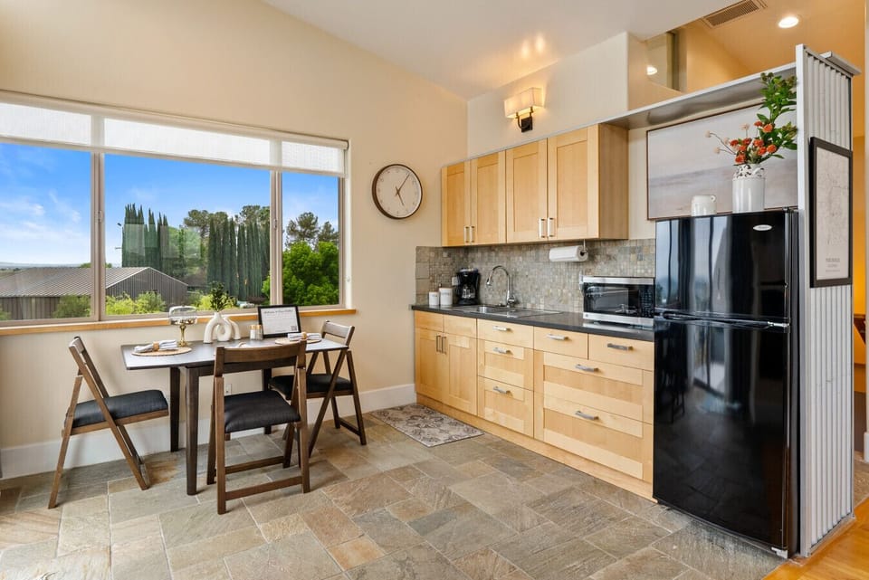 2nd Floor Open Living, Dining, and Kitchenette Spaces Designed for a Relaxed Stay