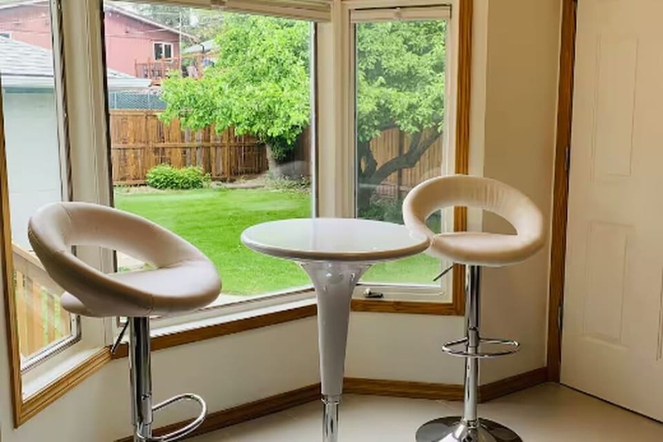 Nook with bar height table and chairs (Main floor)