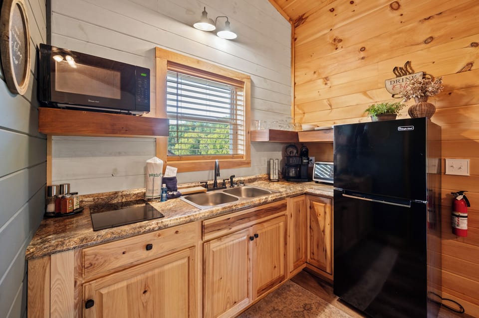 Compact kitchen with everything you need to cook simple meals