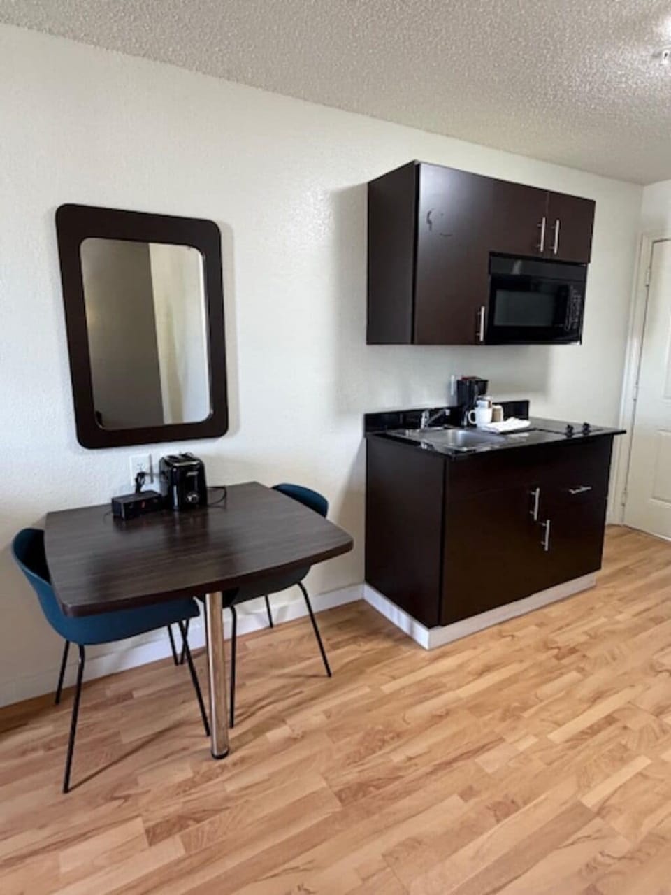 Full-size fridge, microwave, stovetop