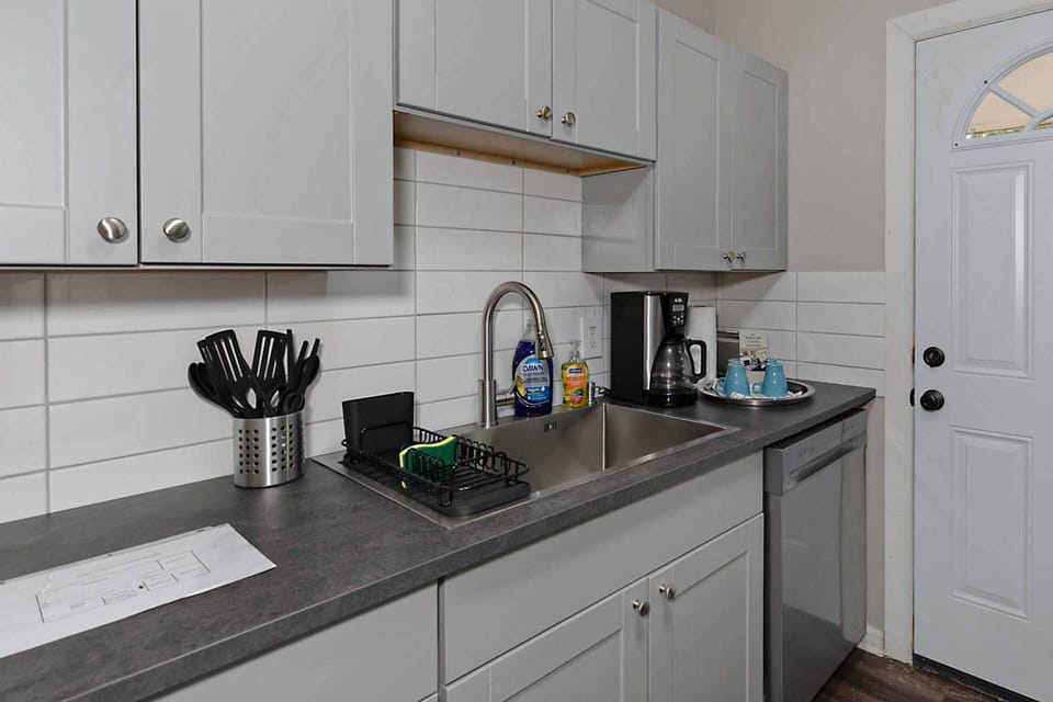 Kitchen w/ Drip Coffee Maker and Basic Cooking Supplies