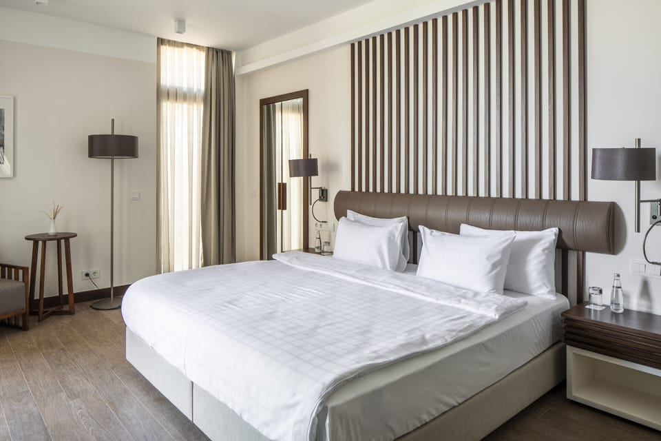 Premium bedding, free minibar items, in-room safe, desk