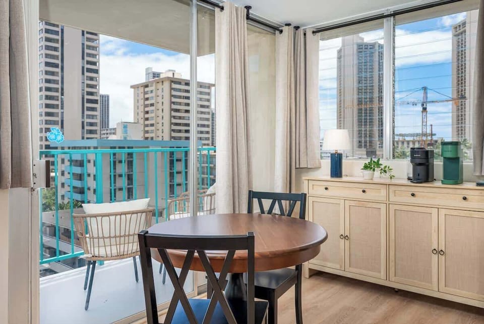 Enjoy intimate meals or catch up on work at this charming kitchen table—perfect for both dining and productivity!
