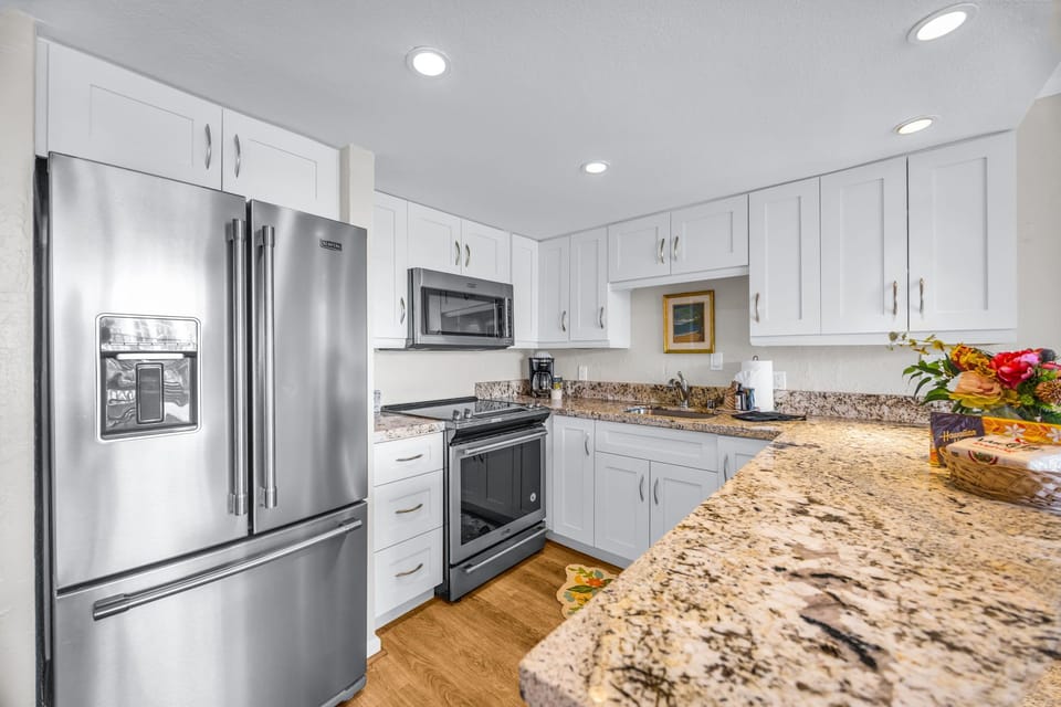 The bright kitchen features updated appliances