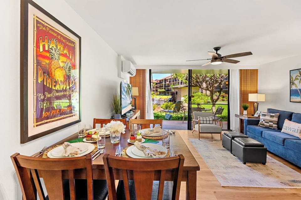 Enjoy meals at your dining table set beneath colorful island artwork, just steps from your lanai and kitchen. PKD-104