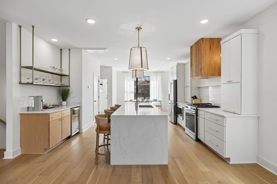 Kitchen: A bright kitchen with a simple yet elegant design.