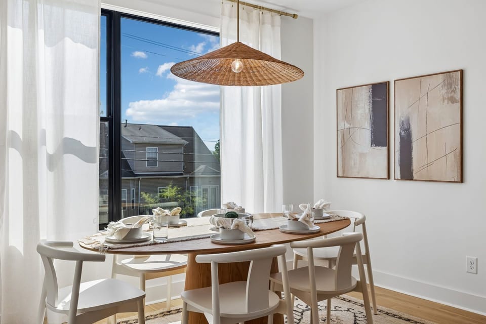 Dining Area: A bright dining area with a relaxed and inviting vibe.