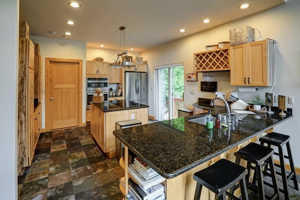 Stocked and Ready - A fully equipped kitchen makes it easy to cook for the whole crew without missing a beat.