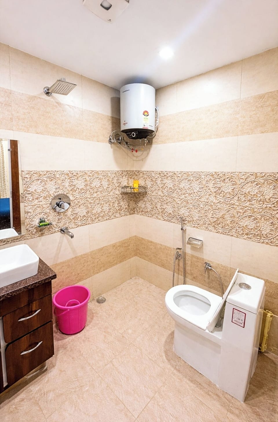 Shower, rainfall showerhead, slippers, towels