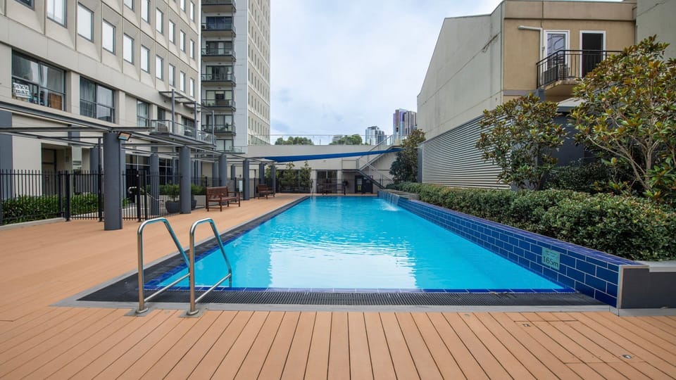 Resort style outdoor pool set on a generous timber deck, ideal for cooling off or soaking up the sun