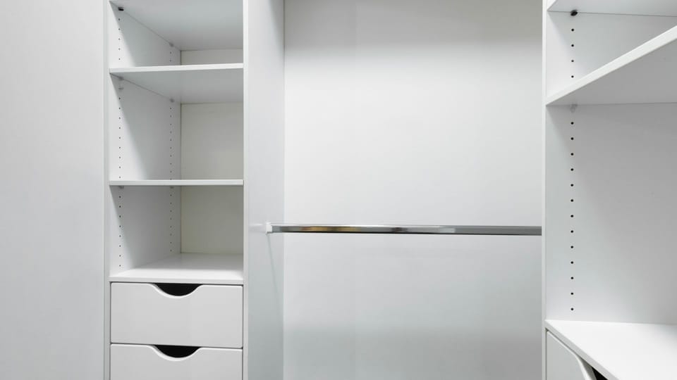 Walk in wardrobe with generous storage, perfect for longer stays or added convenience