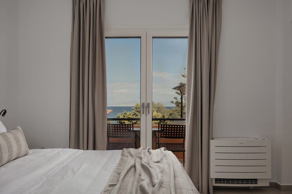 Superior Room, Balcony, Partial Sea View | In-room safe, iron/ironing board, free WiFi