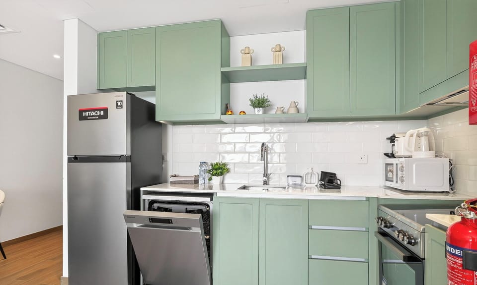 Luxury Apartment, City View | Private kitchen | Toaster, dining tables