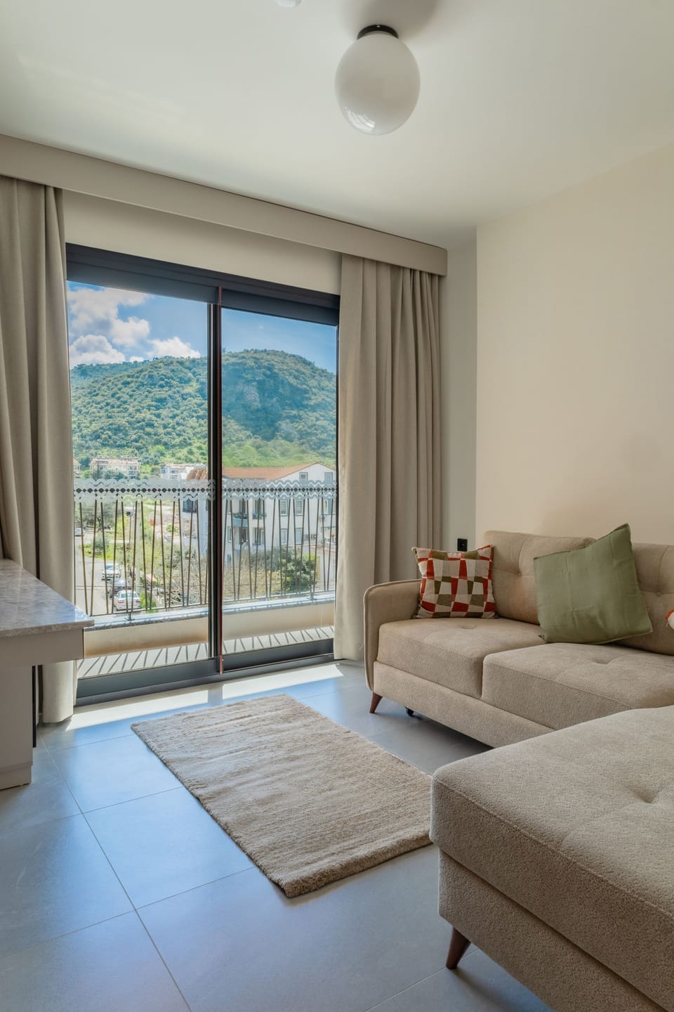Deluxe Suite, Balcony, City View | Living area | 110-cm LED TV with satellite channels