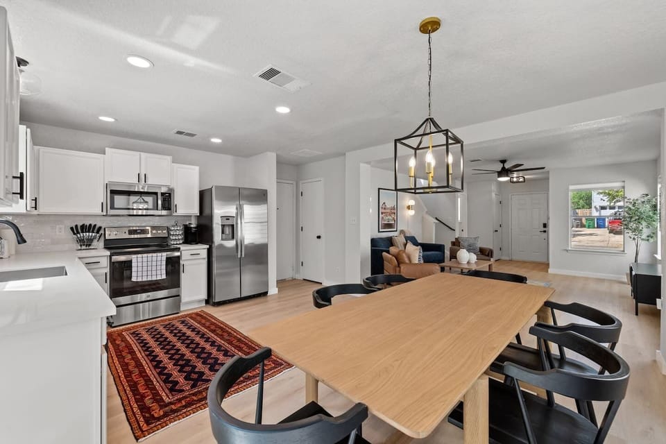 Open-concept space with dining and kitchen
