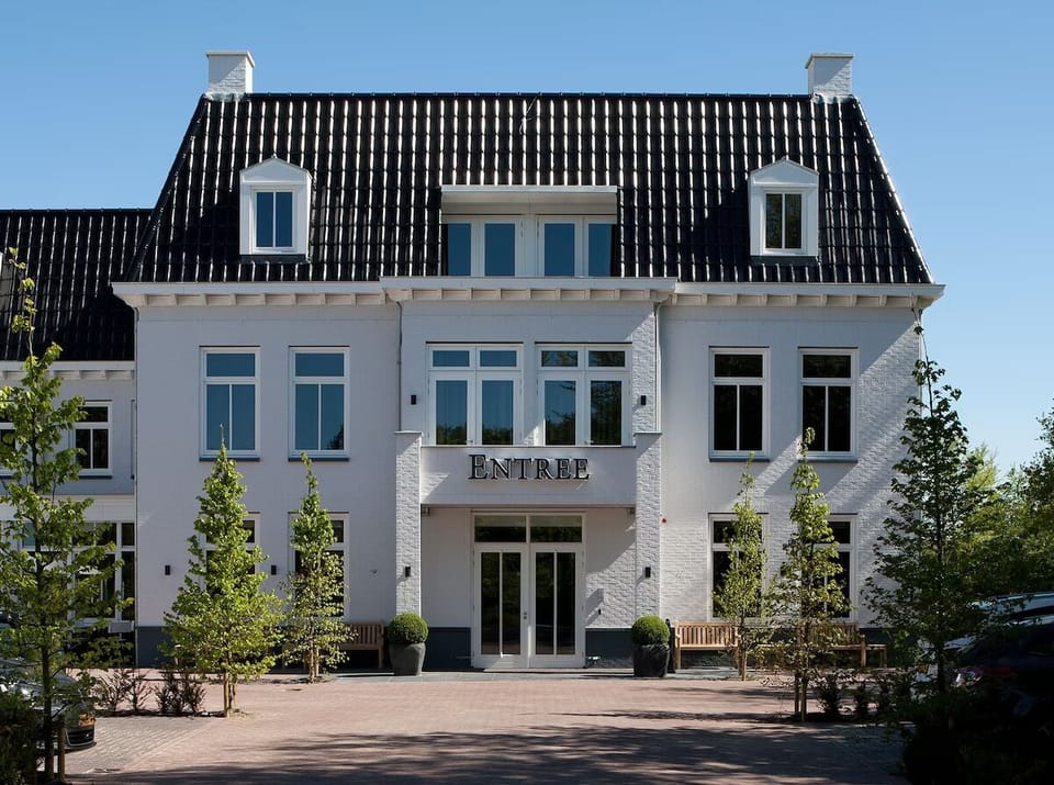 Feel welcomed by the grand entrance and classic architecture.