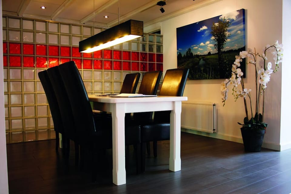Enjoy intimate dining with warm lighting and artistic décor.