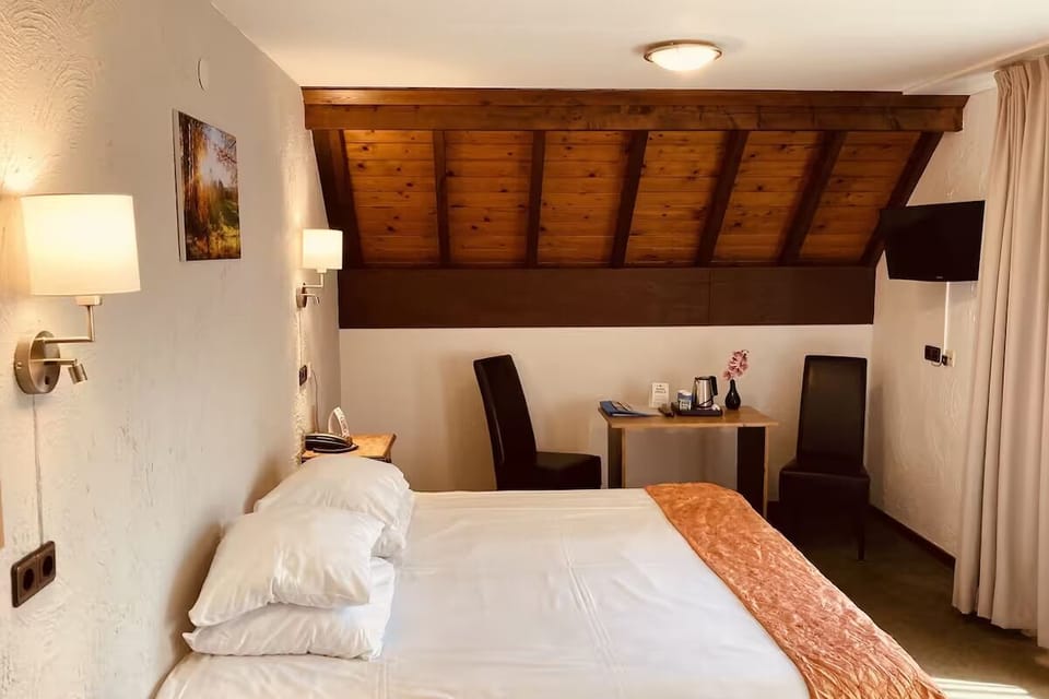 Recharge in a cozy room with seating and warm lighting.