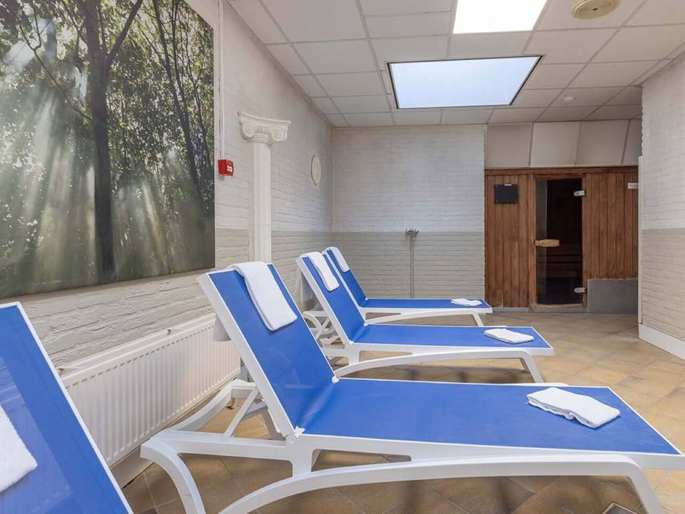 Recharge in the warm wooden sauna after a long day.