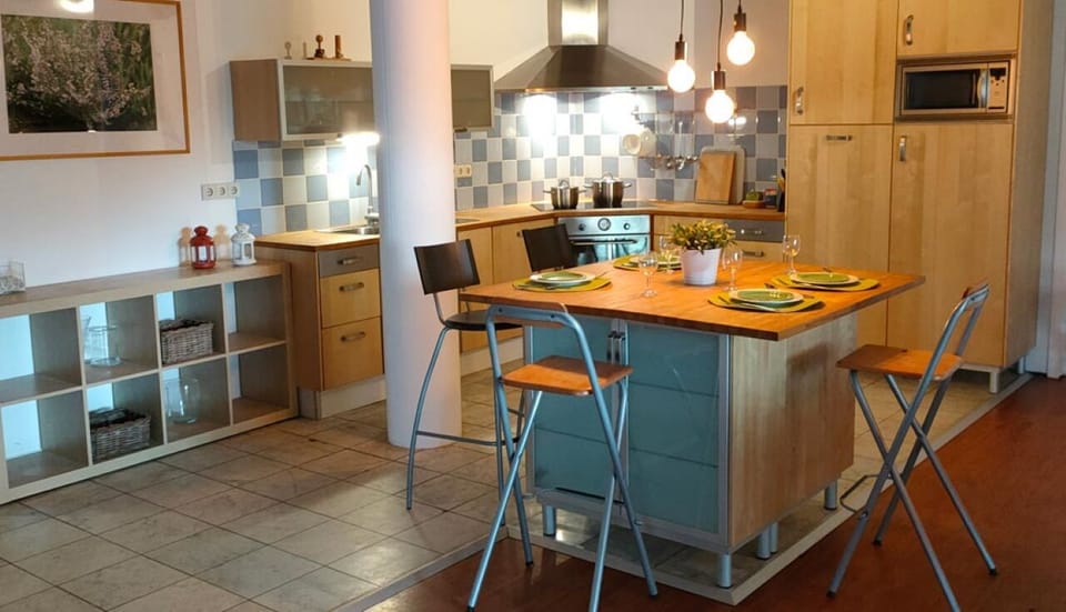 Gather for easy breakfasts in a bright, fully equipped kitchen.