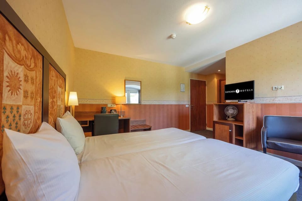 Rest easy in comfortable twin beds after a full day.