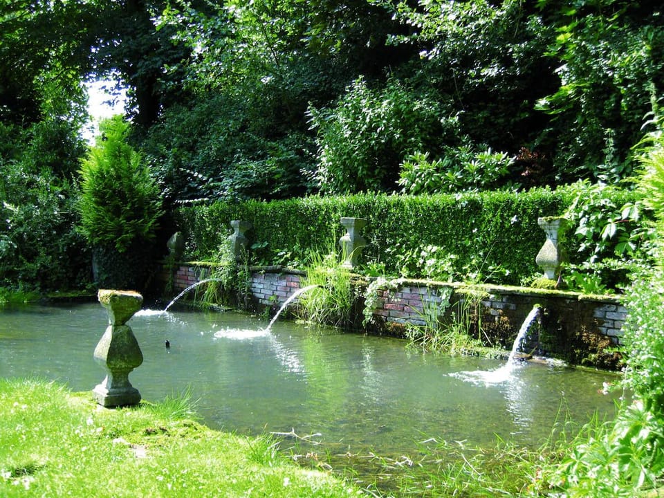 Recharge by the serene pond with gentle fountain sounds