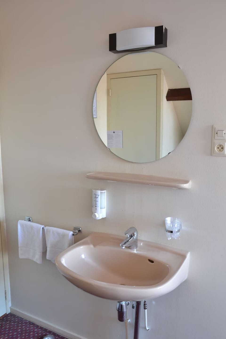 Freshen up quickly at the convenient in-room sink area.