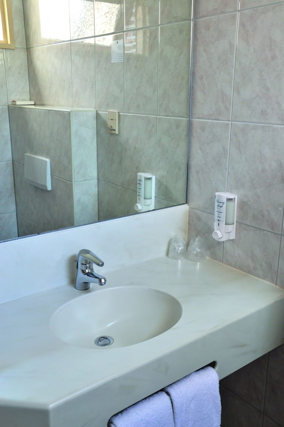 Refresh at the bright vanity with plenty of counter space.