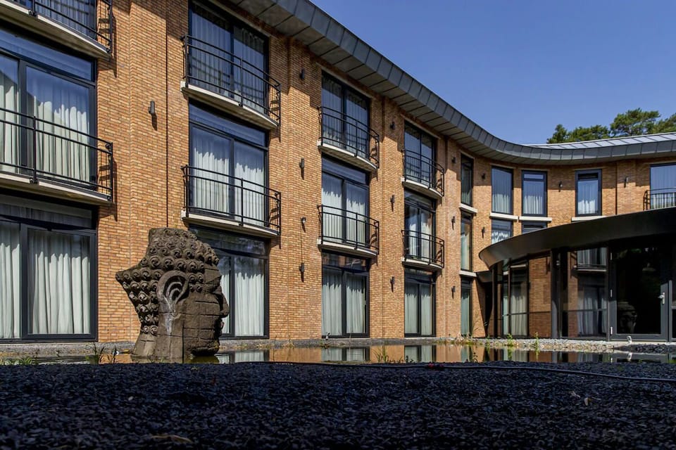 Stroll through the peaceful courtyard framed by modern architecture.