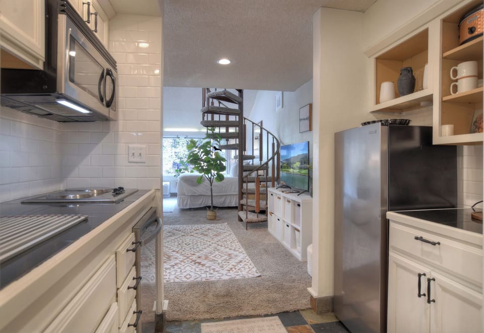 Galley Kitchen with Dishwasher and Large Fridge