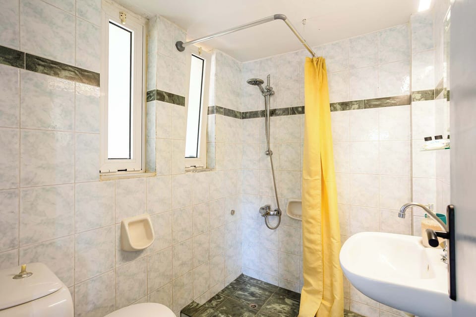 Bathroom with Shower and Bright Interior