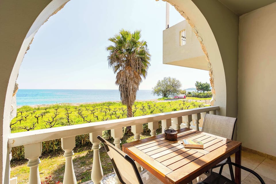 Balcony with Arch Design and Outdoor Dining with Sea View