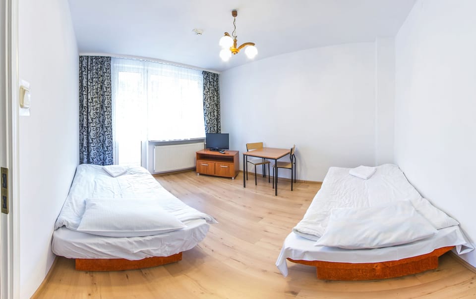 Economy Twin Room | Desk, cribs (surcharge), WiFi (free), bed sheets