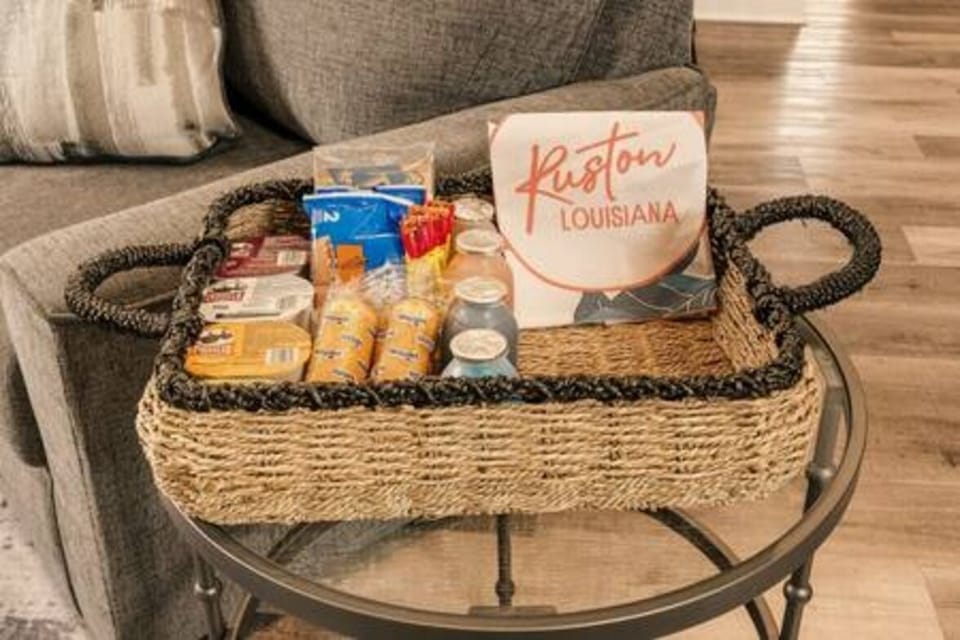 Enjoy a warm welcome with our curated basket of local treats and snacks. Perfect for couples and families to unwind and savor their Ruston getaway. Your cozy adventure awaits!