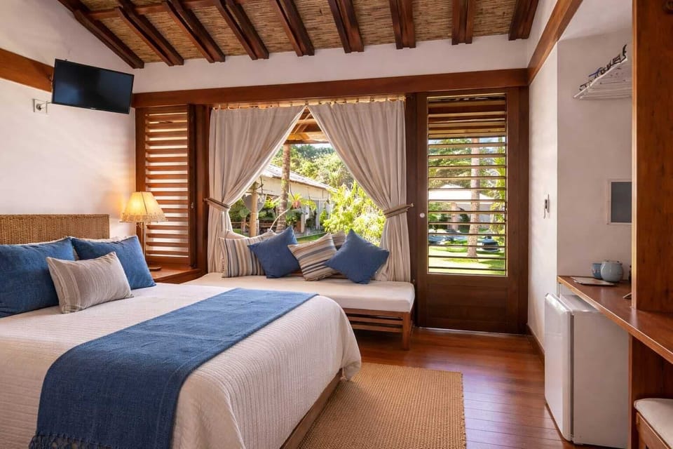Deluxe Double Room, 1 Bedroom, Balcony, Garden View | Premium bedding, minibar, in-room safe, individually decorated