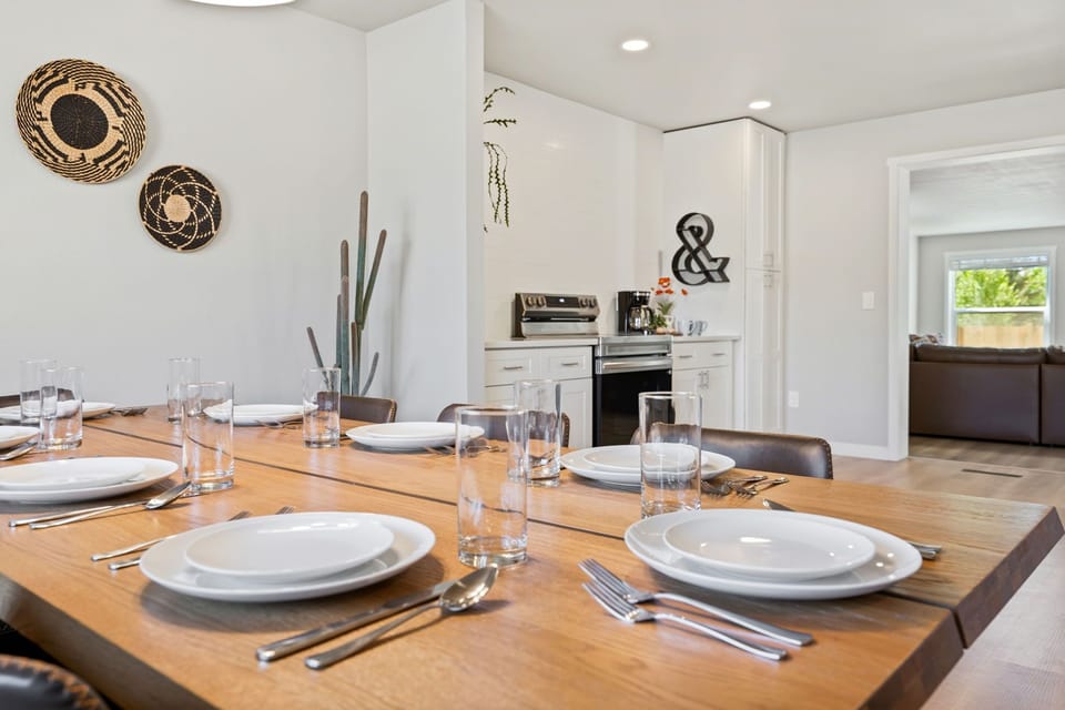 Gather around your stylish dining table where memorable meals unfold, complete with modern kitchen ready for your culinary adventures.