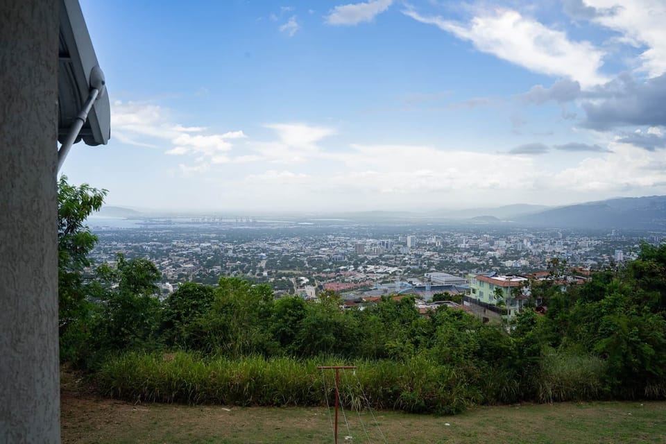 Sweeping views of Kingston & the Blue Mountains — your private hilltop escape