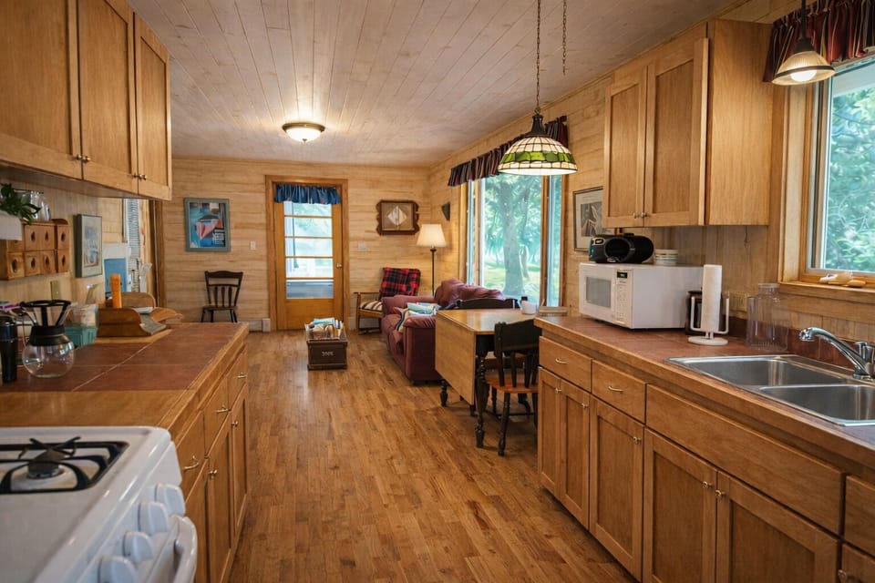 Fully stocked kitchen with ample workspace, ideal for preparing meals during your stay.