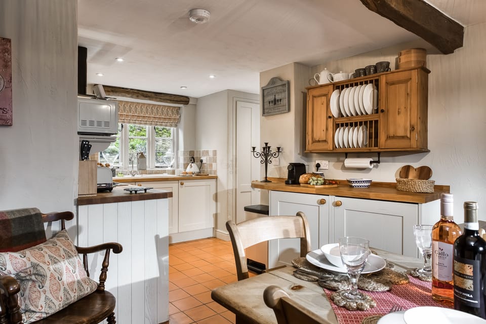 The dining area leads into the kitchen