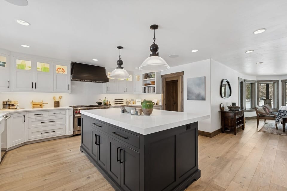 Your gourmet kitchen awaits with gleaming countertops, premium appliances, and a spacious island perfect for preparing meals and gathering with loved ones.
