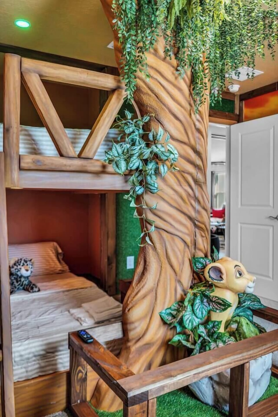 Charming decor accents w/ natural wood & greenery add warmth to the space.