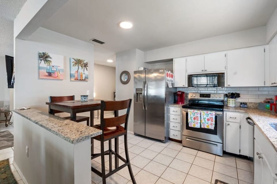 Kitchen | Stainless Steel Appliances | Breakfast Bar Seating