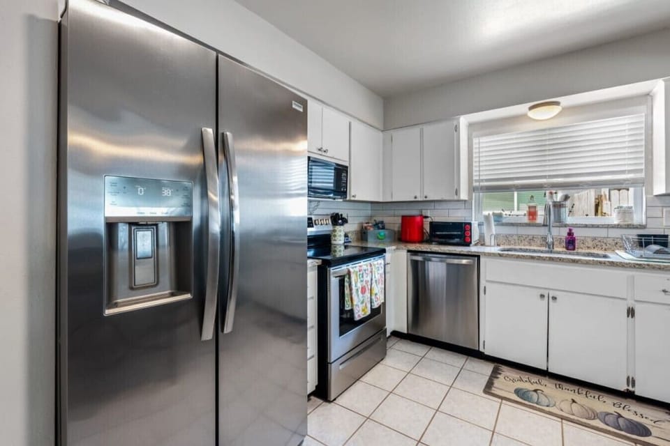 Kitchen | Stainless Appliances &  Granite Counters | Window Light